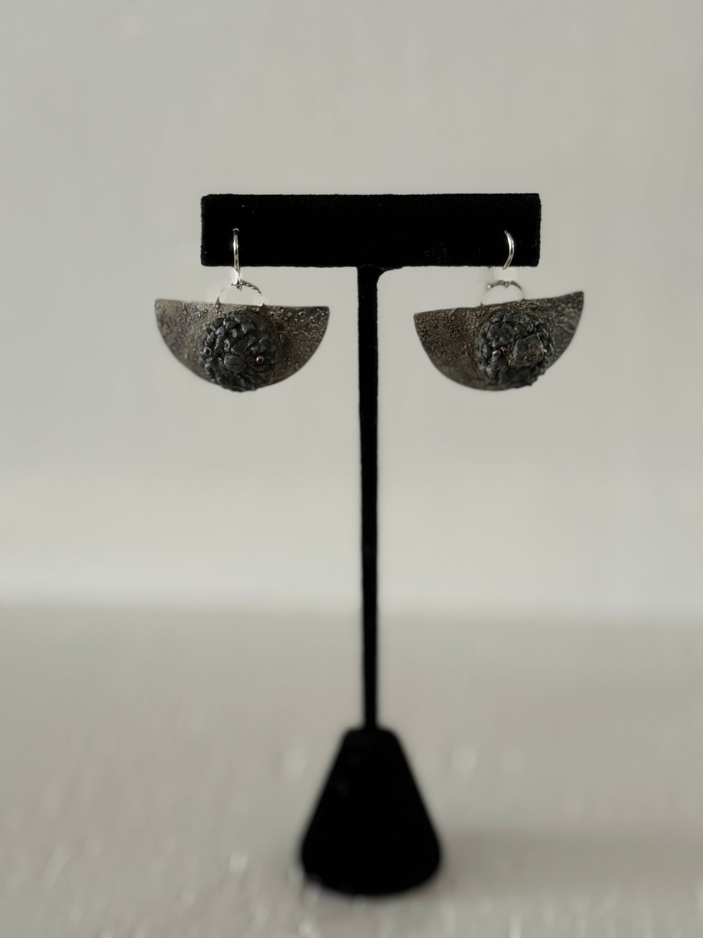 Leigh Roberts: Gesso & Graphite powder acorn on fused sterling earring