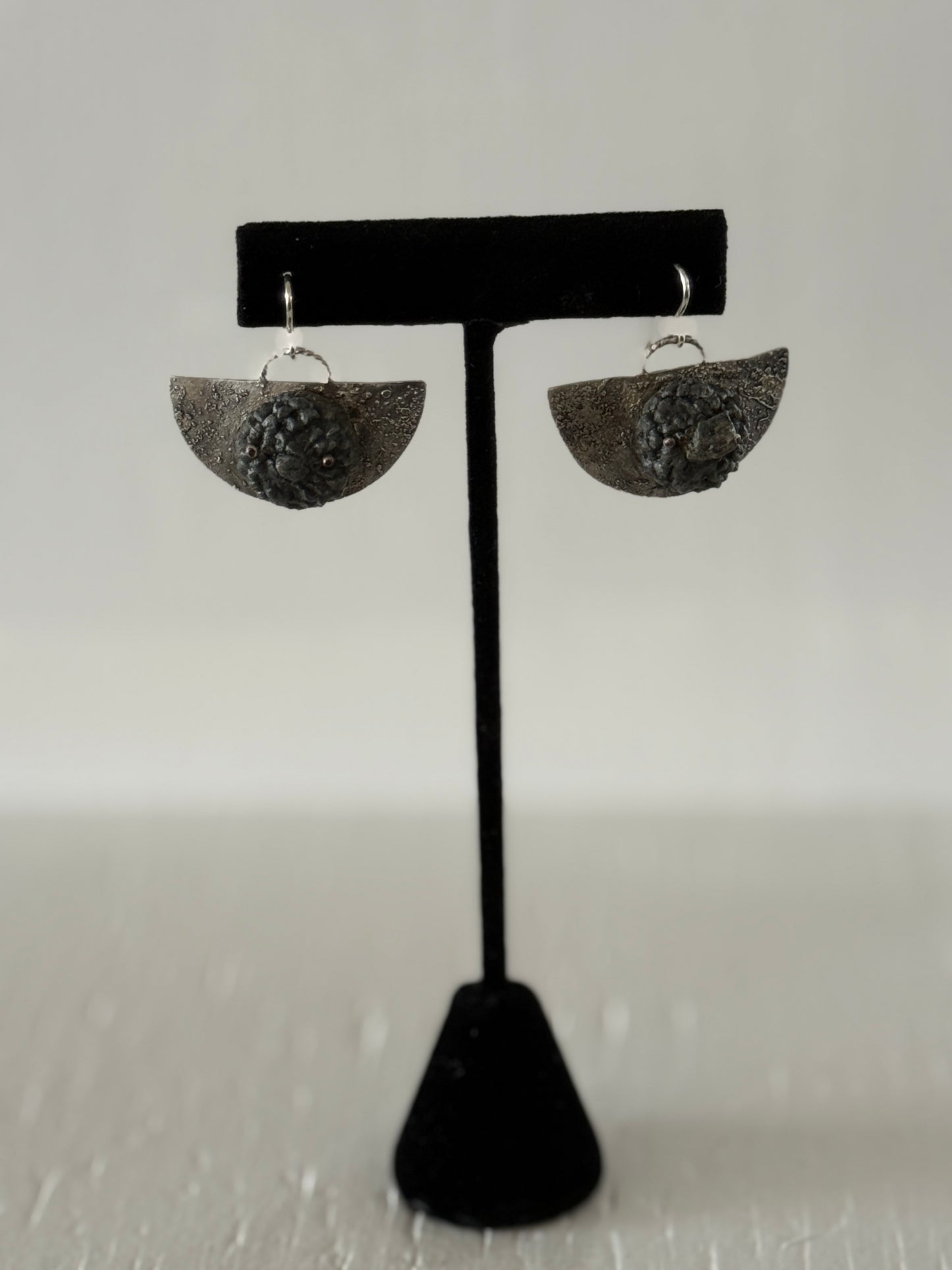 Leigh Roberts: Gesso & Graphite powder acorn on fused sterling earring