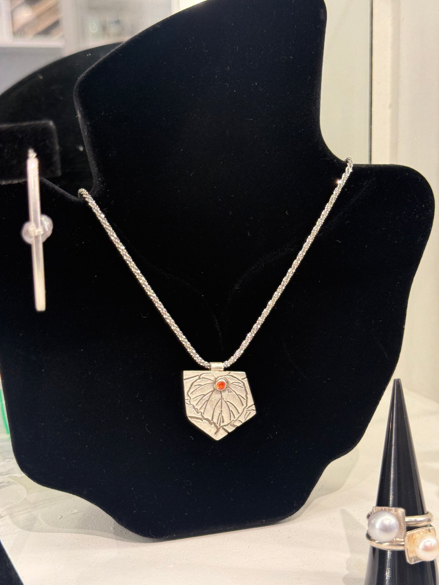 Leigh Roberts: Silver Leaf Pendant w. Orange Cubic Zirconia