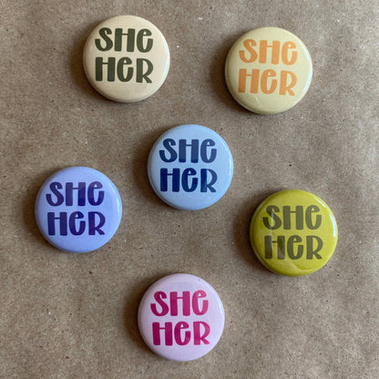 Pronoun pin back button