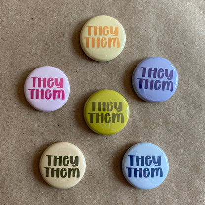 Pronoun pin back button