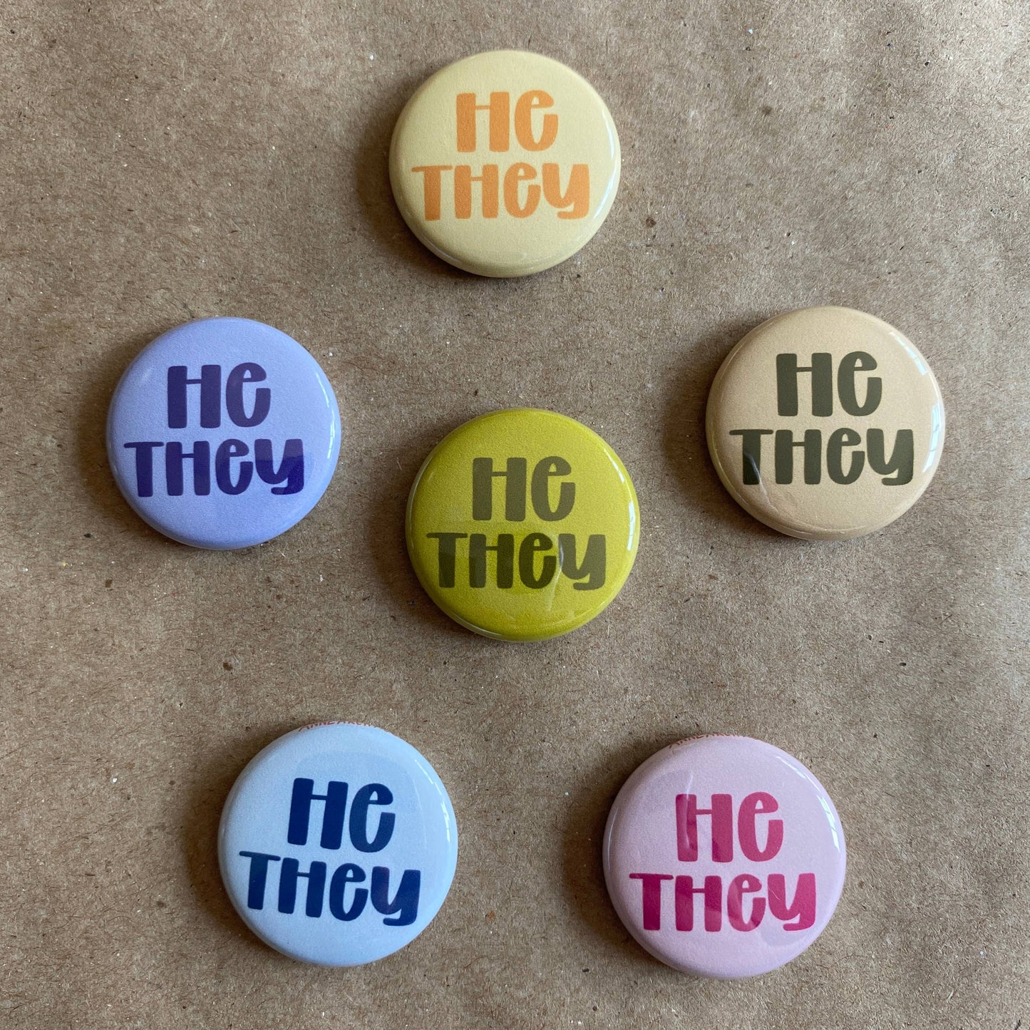 Pronoun pin back button