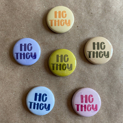 Pronoun pin back button